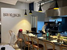 There are eight seats along the bar and this is the best place to sit, so you can watch the chefs work their magic.  Book online and ask for bar seating.