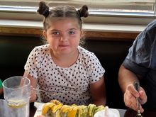 miss Maya not so sure about sushi. But she ate it.me