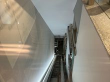 The elevator was on an incline, echoing the siting of the building, and reminded me of a cable car...it was fun to ride up and down!!  