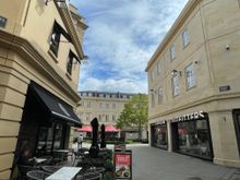 Walking down Newark or maybe stall street.  Urban Outfitters, get out of town, Zara around the corner and a big Marks and Spensers.