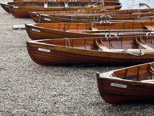 Boats for 3 or 4 people moored on the beach on Derwentwater