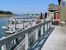 Walkway along the channel. Several restaurants, wine bars and gift shops along this path.  John Wayne's first yacht , the Norwester, was in La Connor in  2016, but then I saw a story that it ran aground in the San Juans.