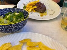 Filete di manzo with fried potatoes and green salad......each was excellent but we were charged for the potato even though the menu said that they accompanied the beef..the meat was very tender and very flavorful.   Forget that old myth about never ordering beef in Italy, outside Florence....
