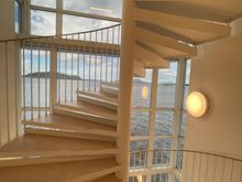 Twisted staircase with an ocean view