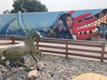 Nice mural with pony statute