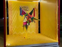 A big box with a decorative pinata. Another photo opp!