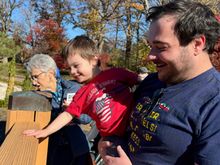 Ethan feeding the Koi fish, Canada geese and mallards.