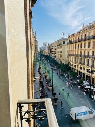 View from the balcony of our apartment. Thankfully, the windows block out a lot of the noise. Fun to people watch!