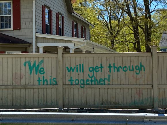 I love this sign on another neighbor’s fence. 