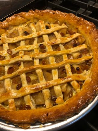 
First time using the new tin and it is HUGE.  Did not have enough pastry for a top crust. So patched together a quasi lattice.  It does look very homemade!