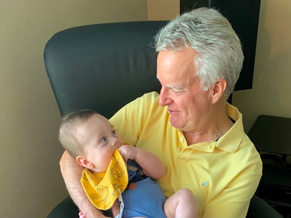 Talk to him and he just smiles and smiles and smiles. They tell me he is a very happy baby.