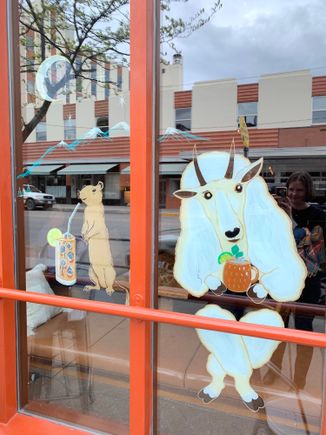A rock chuck and mountain goat enjoying a cocktail at Montgomery Distillery. 
