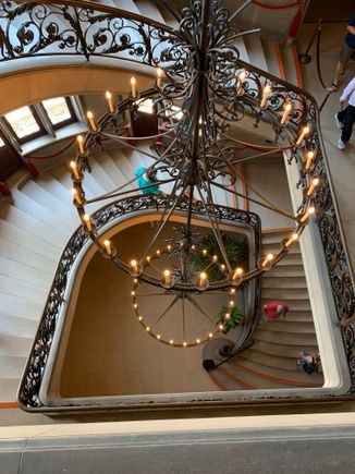 99.9% of everything inside is original, including this three story chandelier weighing 1700 pounds. And it was electric! It had a DC generator in the basement. No expense was spared building and decorating this humongous mansion.