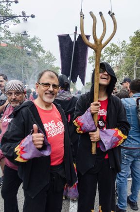 We had a nice chat with this pair. The mentally-challenged son bearing the trident on the right was this year's kids Correfoc parade leader. I explained to his dad on the left how I'd once been a Spec Ed teacher and after that we hit it off.