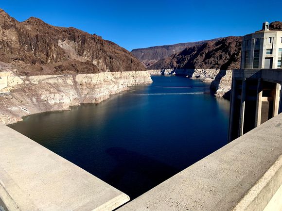The white line indicates the typical water level for Lake Mead before the drought of the last many years… The water levels are down like 170 feet.