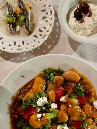 Appetizers: anchovies, tzatziki, gigantes beans