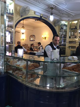 Making and selling their famous pastel de natas (egg custard tarts). Belem,  Lisbon Portugal