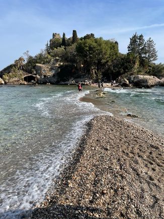 This is another picture to enlarge to see the stone house on the island. The lady in pink is my tour friend. This is also Taormina and that’s the Mediterranean Sea. Think White Lotus, Season 2. 