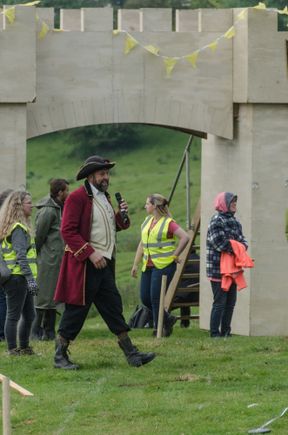 One organizer became rightly FURIOUS after careless parents allowed their children to frolic in the fields below. Nearly 100 excited kids collected there. Thing is, there were fireworks planted there. He went ballistic and who could blame him? The announcer above rightly asked the crowd watching the shin-kicking from the hill then, "Folks up there: whose little girl keeps screaming 'BLOOD!!' ? He wasn't kidding. The girl was quite animated and everyone in the large crowd heard her every shriek!