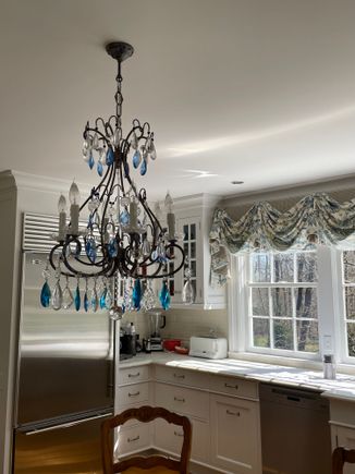 This really was perfect in our CT kitchen - it was bought in a local shop for our Switzerland dining area.  Another nice antique one is in our bedroom. 