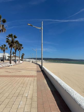 
Beach promenade in Barbate....sand is fine and almost white, but it can get very windy along this coast.  I had to shield my eyes when I took a post-lunch walk.