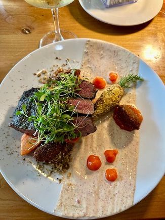 African flavored lamb with red lentil croquettes, apricot marmalade, carrots and a yogurt spiced sauce.