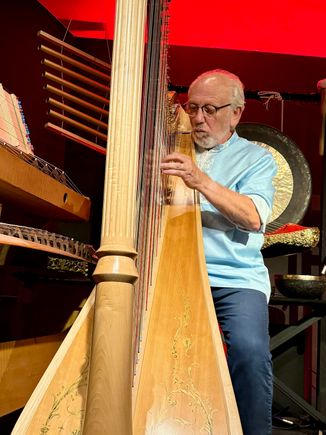 This gentleman has been putting on free harp concerts for a long time. He builds and collects harps and played probably eight during the 40 minute performance, which was wonderful.