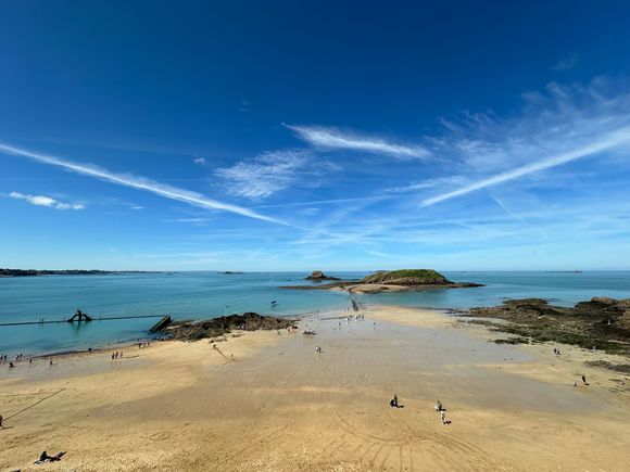 People wading out to see the Old National fort. 