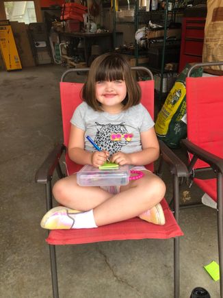 Here she is helping me make T-Bone steaks for supper. She is making up a math test for me. I may need Percy......