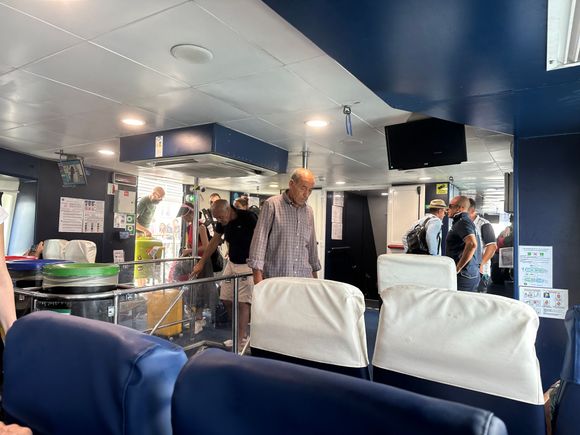 Interior of hydrofoil to Salina.  Very HOT.  Note to bring a fan next time; many people were fanning themselves with real fans or whatever they could get their hands on, including their cell phones!