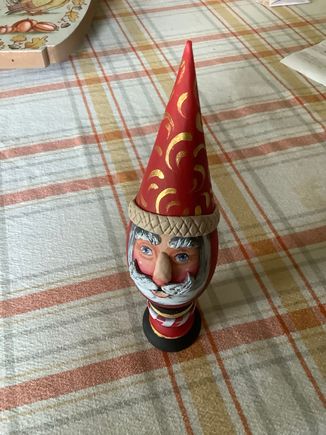 Ths is my favorite. Wooden egg has a paper mache cone hat and sits on a small, short turning.mit is embellished with Quikwood to make nose,mhat band, etc. i still need to paint hat band white.