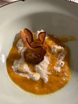 My antipasti at the excellent LA PINNATA DE MONSU RESTAURANT, outside Malfa town; Cream of Pumpkin with a jammy egg, dusted with bread crumbs, dollops of robiola cheese, and crispy razor-thin bread rounds baked with olive oil 16 euro