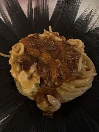 Spaghetti with small shrimp and sea urchin...one of the restaurant's classic dishes.   I asked for bread crumbs on the side.  Our wonderful waiter told me that asking for bread crumbs was fine, as pasta with ricci di mare is often served with them.  But he said, laughing, "Bread crumbs are great, but you obviously know your Italian food.....you would be shocked at how many tourists ask for grated  cheese with their seafood pasta!!  (Definite faux pas, except perhaps in Sardinia)