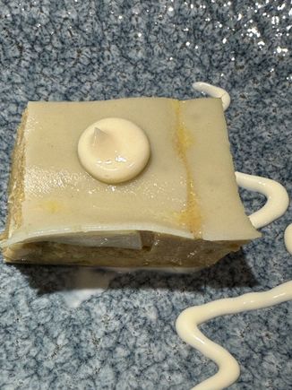 Aperitivo of tuna lasagna..impossibly thin sheets of pasta wedged between luscious pate of bluefin tuna