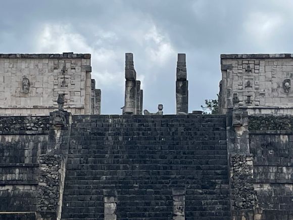 Temple of the Warriors, there are some great carvings on the structure and all the way at the top, between those pillars is a reclining Chaac Mool.