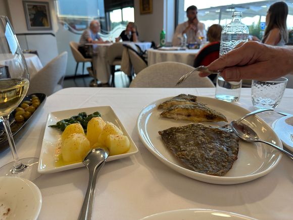 Those marvelous Galician potatoes, dusted with smoked paprika, served with my half of the Dover sole (It's "languado" here, with no mention of the name Dover, but it is the same fish, that bears as astronomical price in the US IF you can find it.