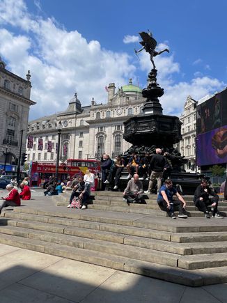 I believe this the God Eros, it sits in the middle of Picadilly Circus. A big magnet for sitting down and getting your photo taken