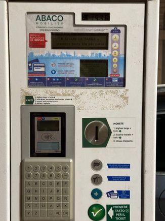 One of two photos of parking meter; waiting for the second one to upload.  First step:   Type in your plate number, using the keyboard.  This should appear in the screen at the top.   If you need to add a digit, just add any at all (read the thread for details)