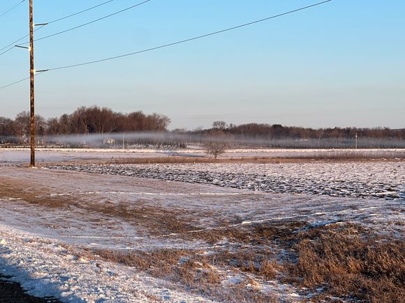 Those are deer tracks in the snow crossing the ditch.  That is one stinky whisp of air.