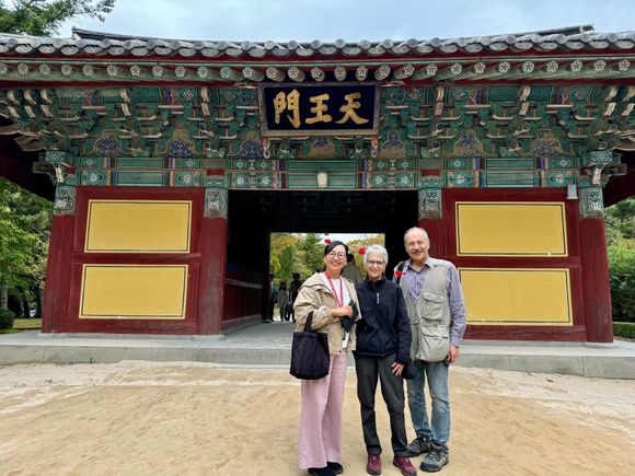 Our guide, Joyce and Yury in front of the main gay.