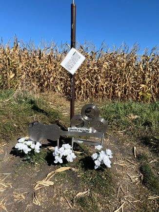 3 records and a guitar for markers and a photo book of the news parer articles about the crash.