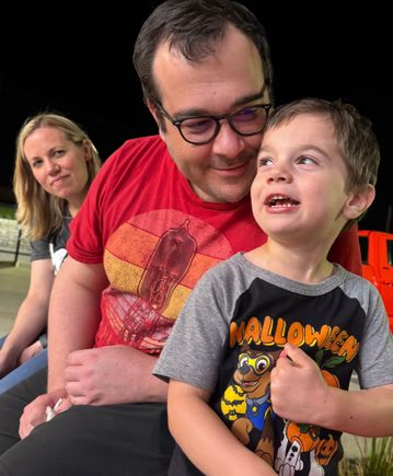 Ethan and his parents, Nick and Brittany