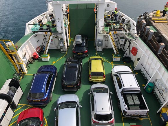 Our car is the blue car on the left