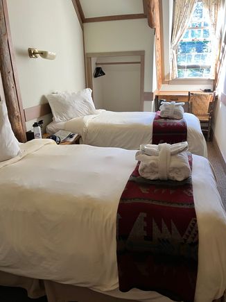 Our small twin room (rivals the small hotel rooms in Japan). Bathrobes and slippers provided for rooms with shared baths. 