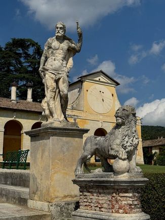 The statues outside are of Olympian gods