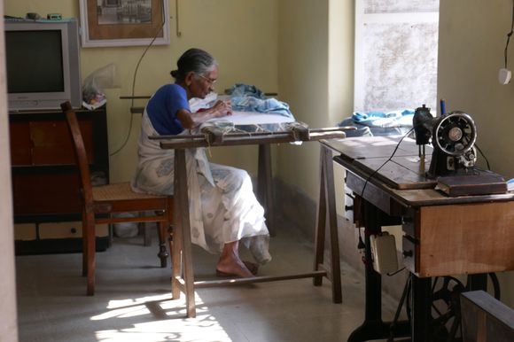 One of the workers in Sarah's shop