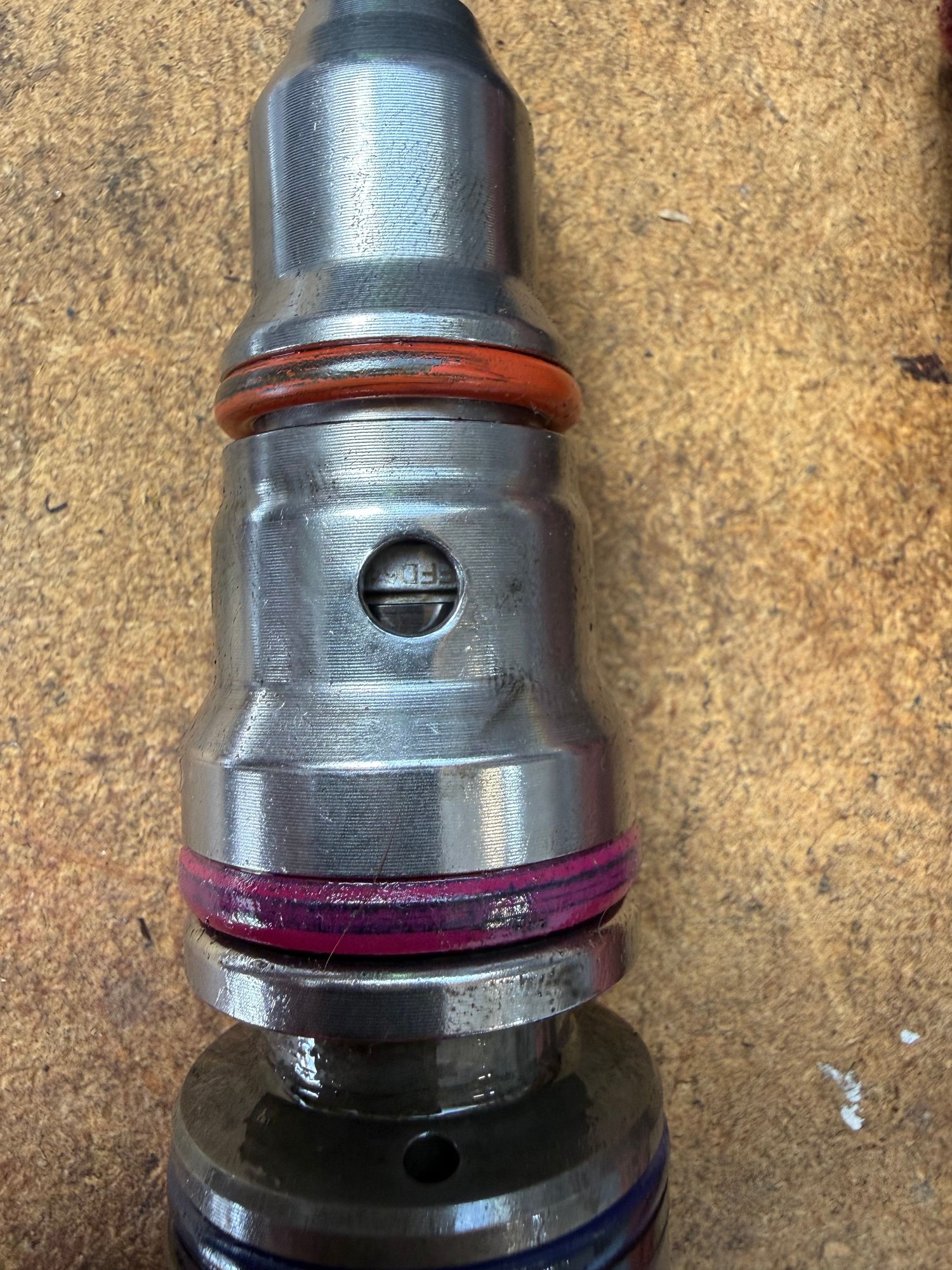 Looks like compression gases past the seal to me. 