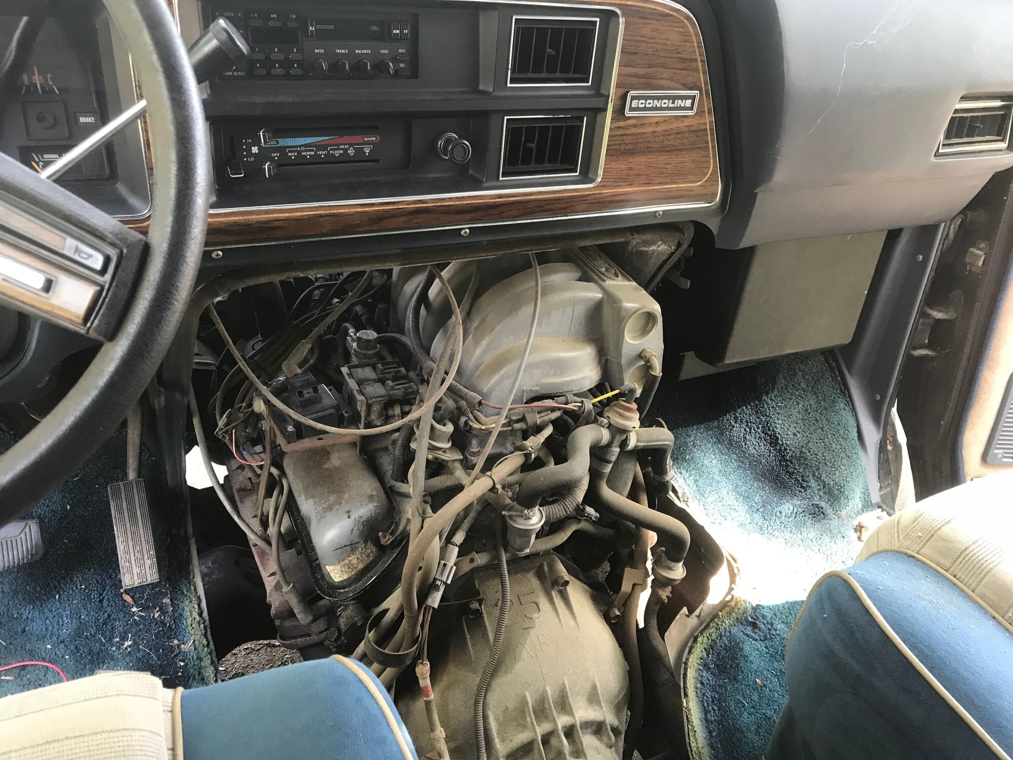 Tried using old coil from Jeep XJ , used jumper wires and one bolt holding to bracket.  New NGK coil is now installed but not in this early diagnostic pic on this trip to rescue this whip.