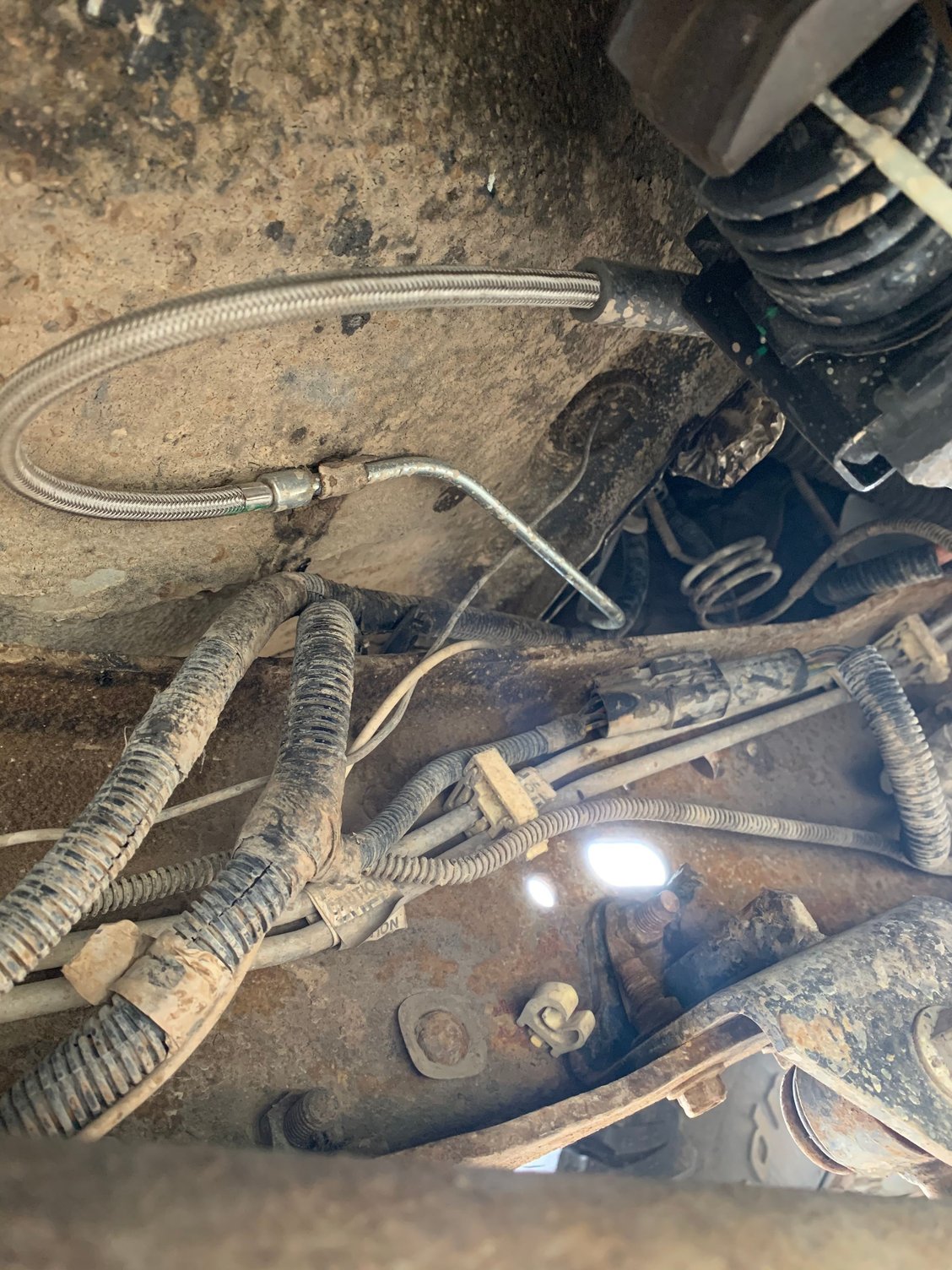 routing clutch master cylinder hydraulic line to slave cyilndar. 1989