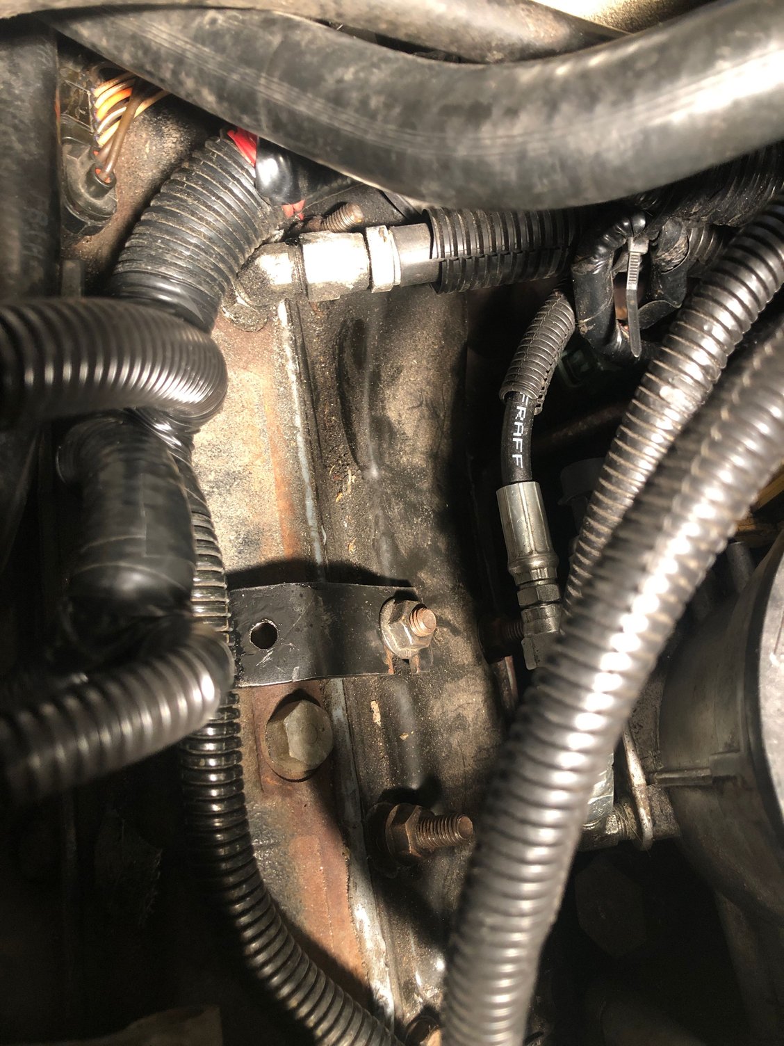 I even made a bracket to support the wiring harness. I utilized one of the plenum bolt/studs to secure it. 